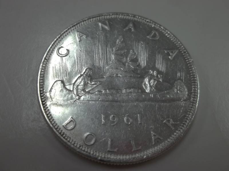 lot 113 image: 1961 Voyager Canadian Silver Dollar 80% Silver