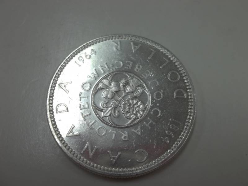 lot 115 image: 1964 CANADA SILVER DOLLAR COIN- CANADIAN CENTENNIAL SILVER COIN 80% Silver