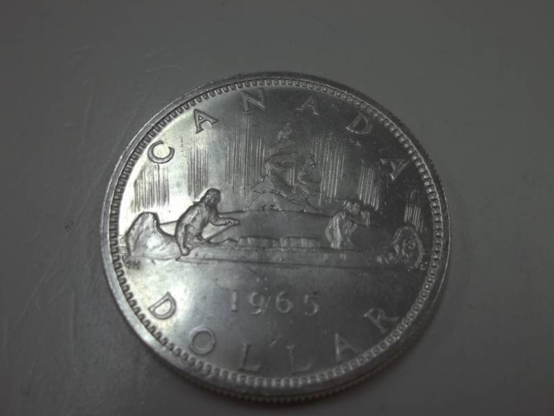lot 121 image: 1965 Voyager Canadian Silver Dollar 80% Silver