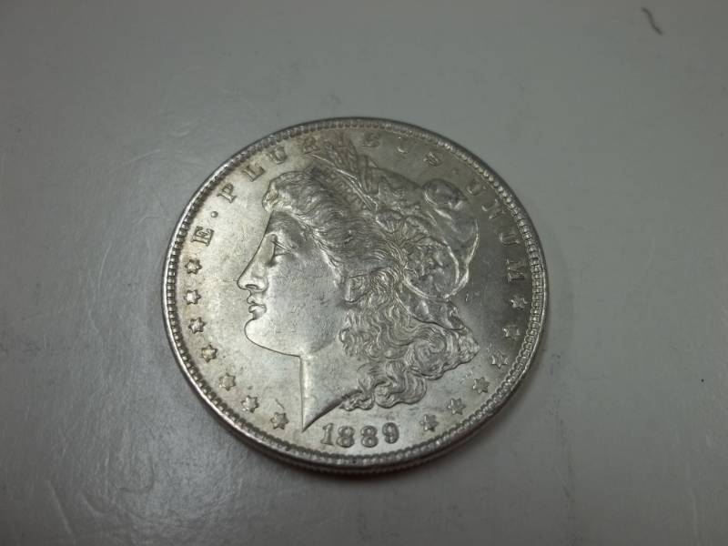 lot 144 image: 1889 Morgan Silver Dollar 90% Silver