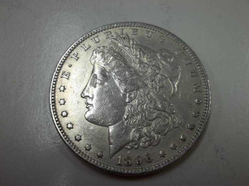 lot 145 image: 1886 Morgan Silver Dollar 90% Silver