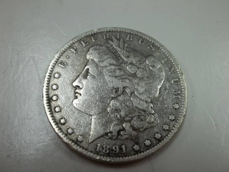 lot 147 image: 1891 Morgan Silver Dollar 90% Silver