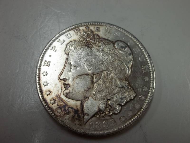 lot 154 image: 1885 Morgan Silver Dollar 90% Silver