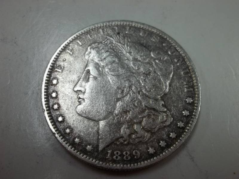 lot 157 image: 1889 Morgan Silver Dollar 90% Silver