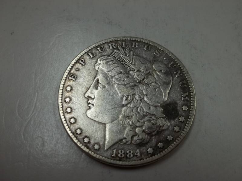 lot 163 image: 1884 Morgan Silver Dollar 90% Silver
