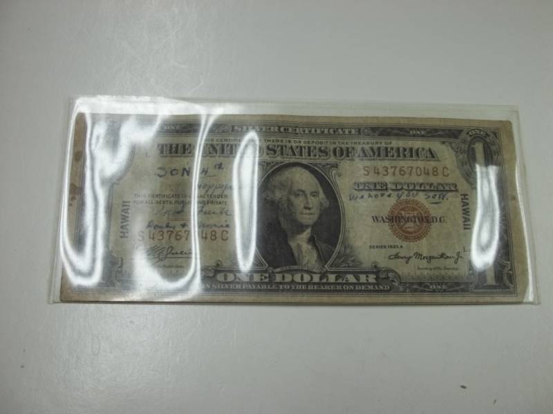 lot 214 image: One Dollar Silver Certificate 1935