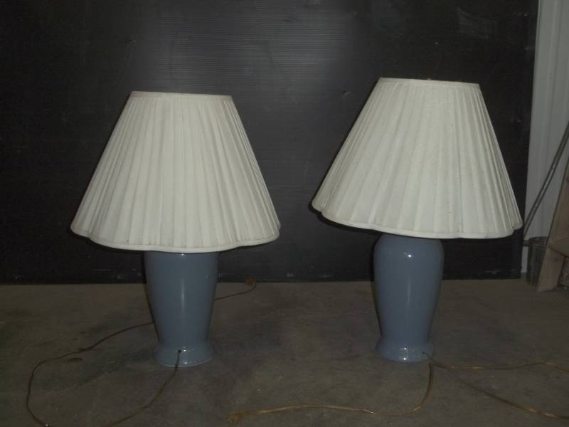 lot 14 image: Pair of lamps, blue