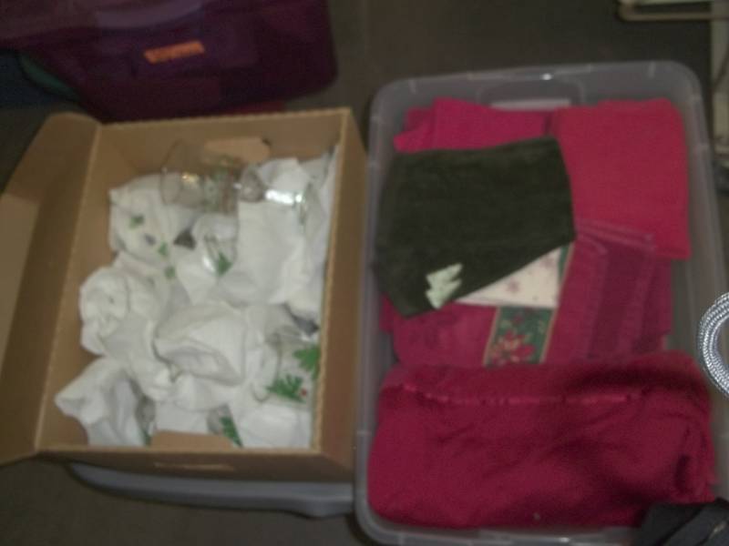 lot 21 image: Box of Christmas Cups And Goblets with tote of Christmas towels