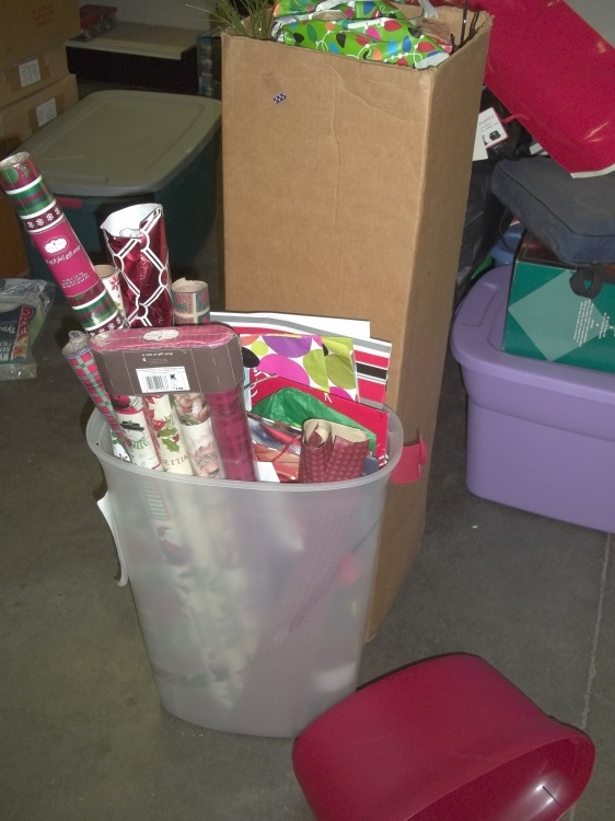 lot 62 image: Lot of 2 containers with Christmas Paper & bags