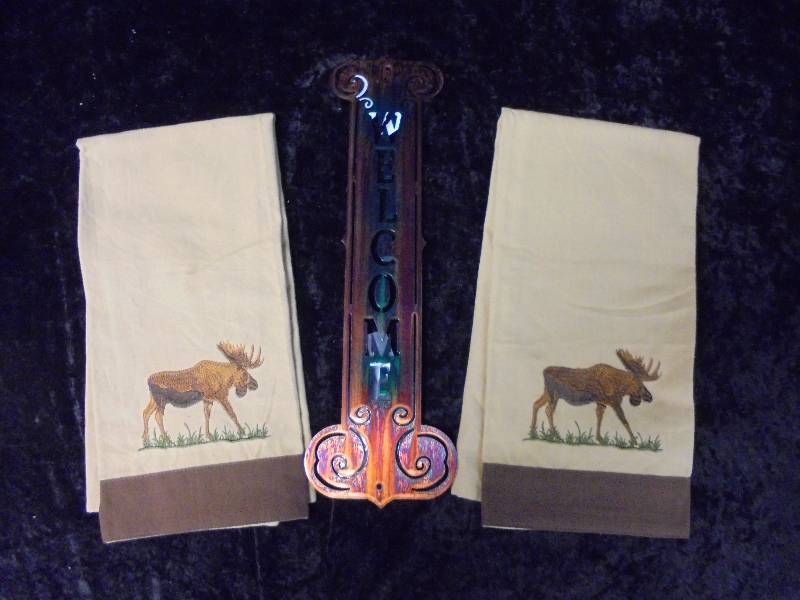 lot 38 image: Lot - Park Desgns New Moose Hand Towels & Metal Moose Candleholder