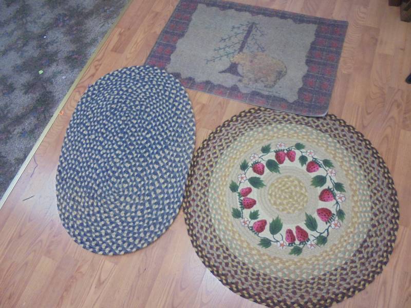 lot 80 image: Lot - (2) Braided Rugs (30 & 26) & Rubber Backed Bear Rug
