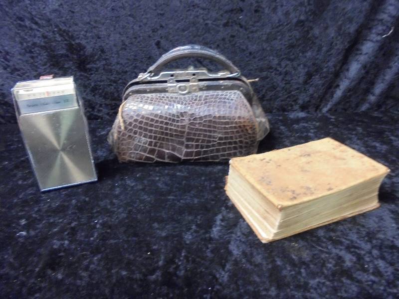 lot 89 image: Lot - Antique 1856 Bible, Leather Purse, Radio
