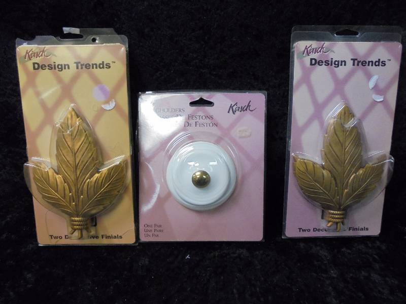 lot 102 image: Lot - KIRSCH New Curtain Swag Holders & Finials