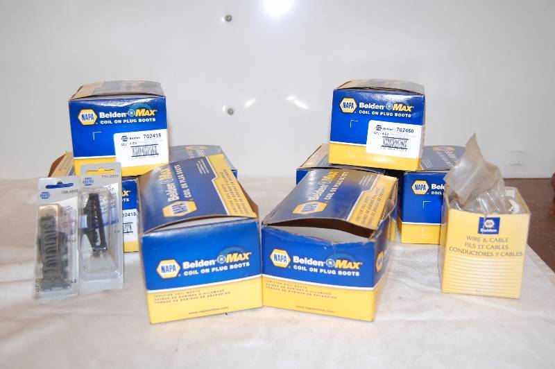 lot 95 image: Coil On Plug Boots and Spark Plug Wire Retainers