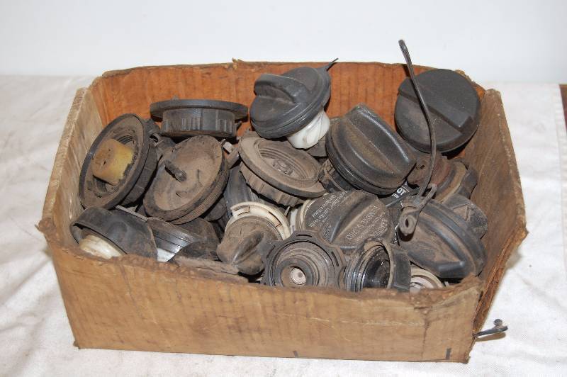 lot 167 image: Box of Used Gas Caps and Oil Caps