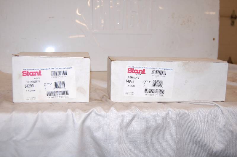 lot 217 image: Thermostat Housings with Thermostats