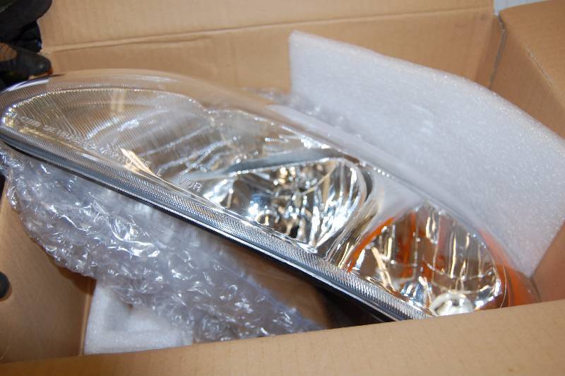 lot 238 image: Full Headlight Assembly