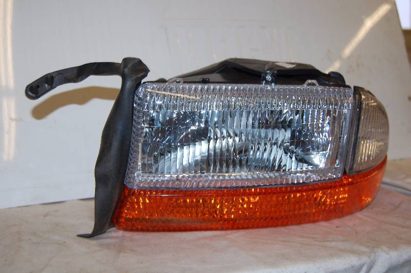 lot 239 image: Full Headlight Assembly