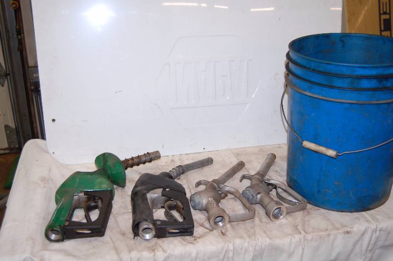 lot 319 image: Used Gasoline Pump Nozzles