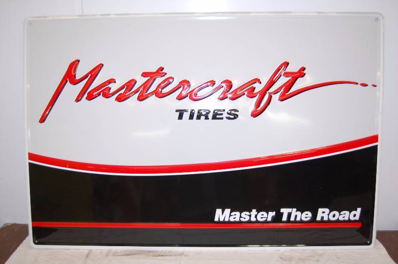 lot 401 image: STEEL MASTERCRAFT TIRES sign
