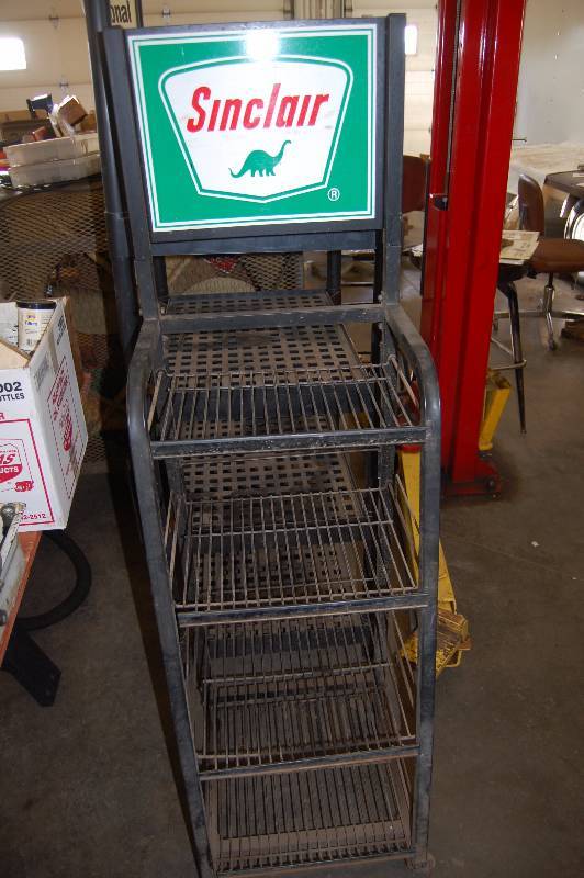 lot 472 image: Steel Sinclair Oil Display On Casters