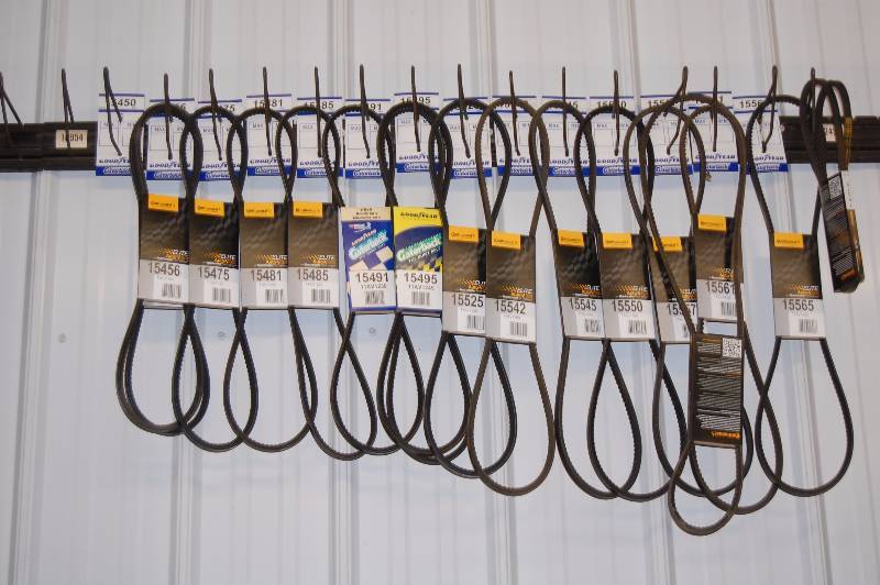 lot 517 image: Goodyear and Continental Belts and Rack