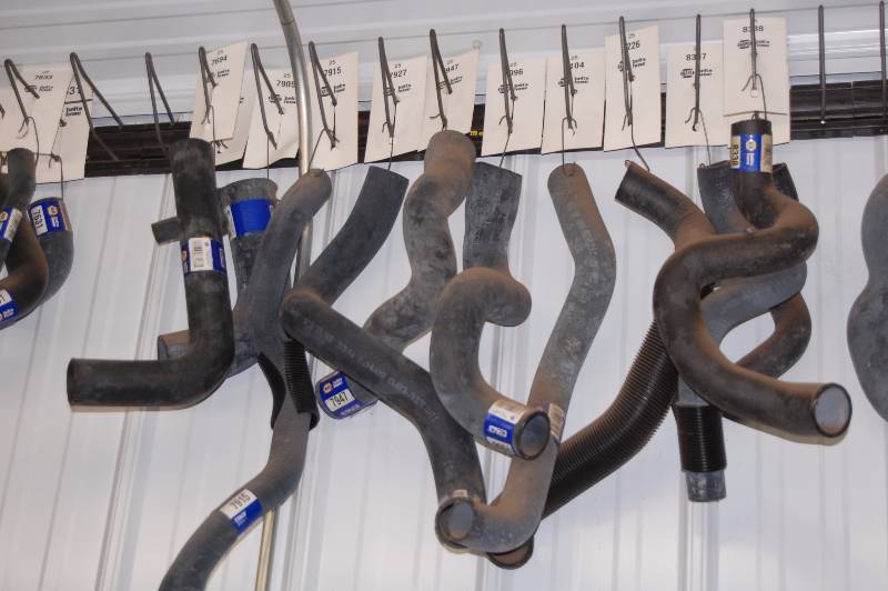 lot 520 image: Radiator Hoses and Hanging Rack