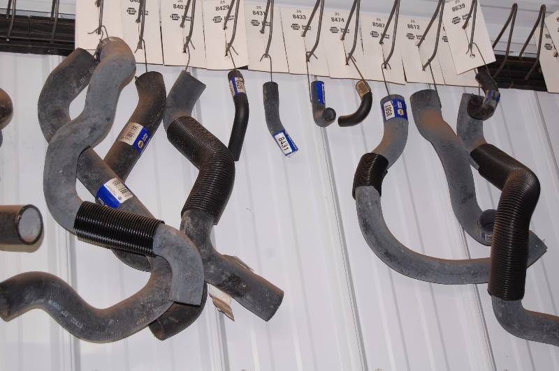 lot 521 image: Radiator Hoses and Hanging Rack