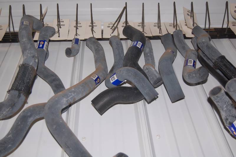 lot 522 image: Radiator Hoses and Hanging Rack