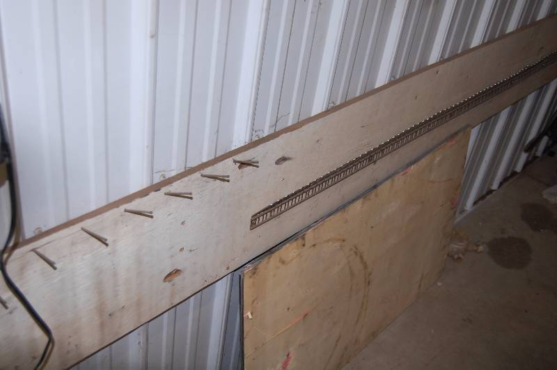 lot 529 image: Belt Display Rack on a Board
