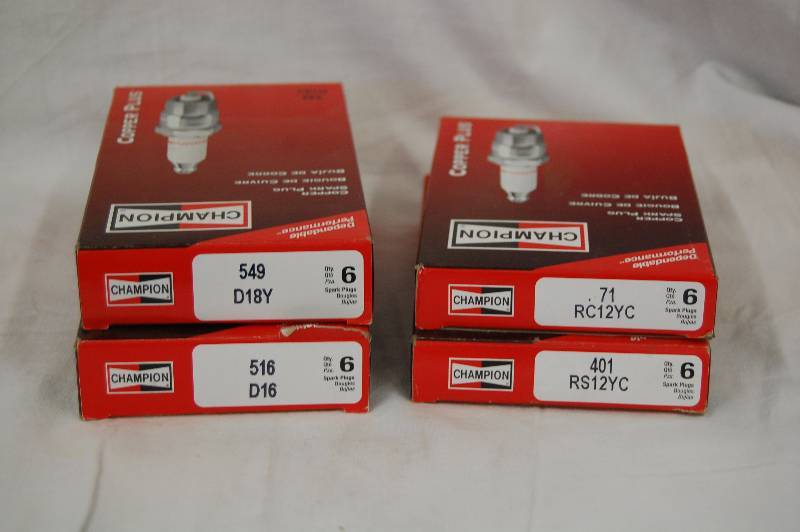 lot 537 image: Champion Spark Plugs