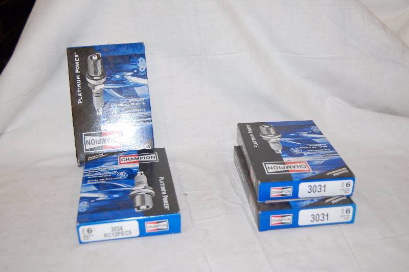 lot 543 image: Champion Spark Plugs