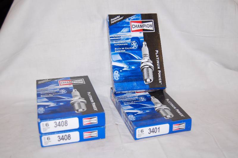 lot 544 image: Champion Spark Plugs