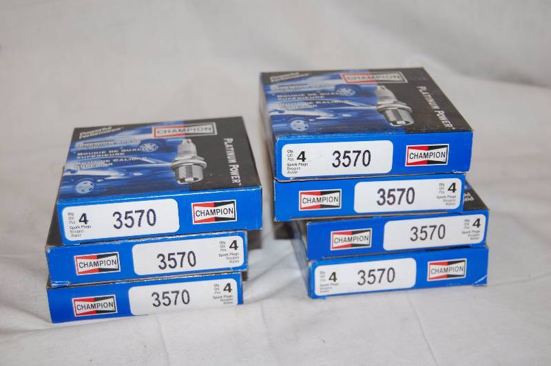 lot 546 image: Champion Spark Plugs