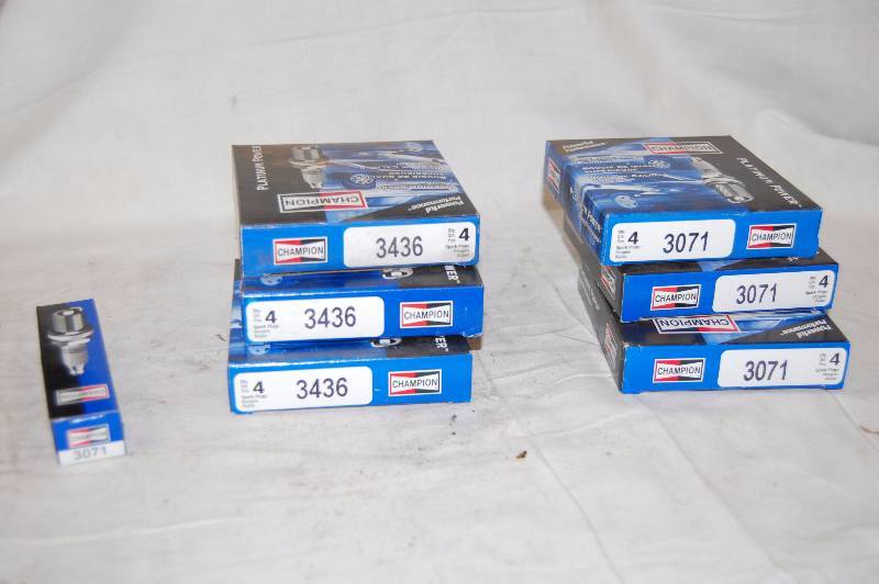 lot 550 image: Champion Spark Plugs