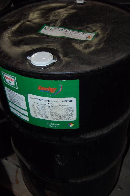 lot 1705 image: 55 Gallon Drum of Supreme Motor Oil SAE 10W-30
