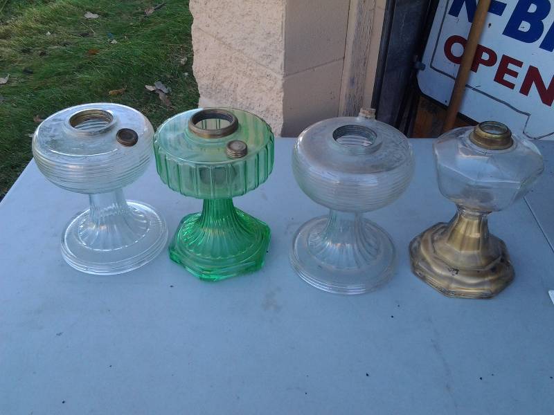 lot 15 image: 3-Glass Aladdin Oil Lamps