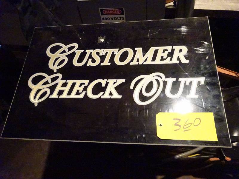 lot 360 image: Check Out Sign