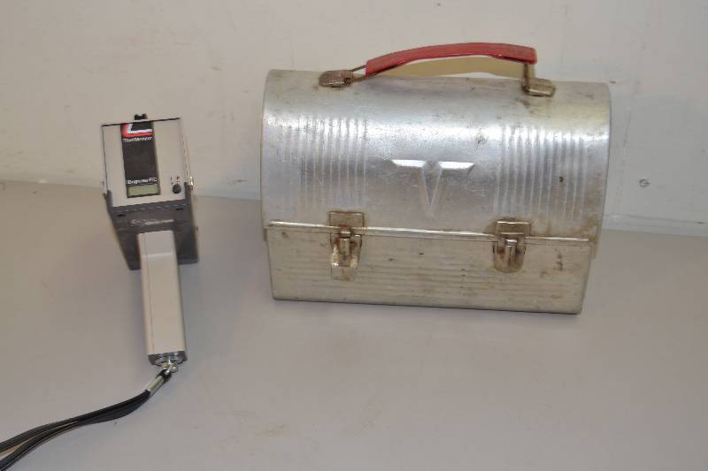 lot 188 image: Vintage Lunch Box Temperature gun
