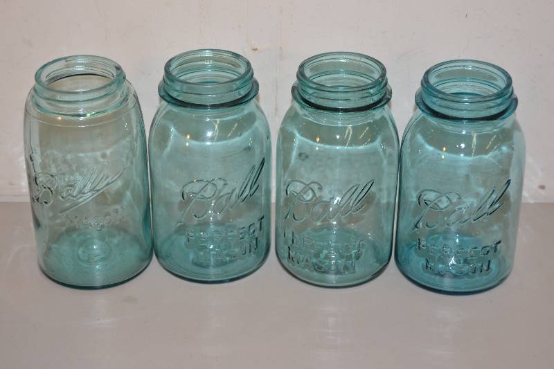 lot 14 image: Blue Glass Ball Mason Jars