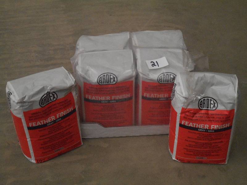lot 21 image: (6) New Bags Of Gray Feather Finish...