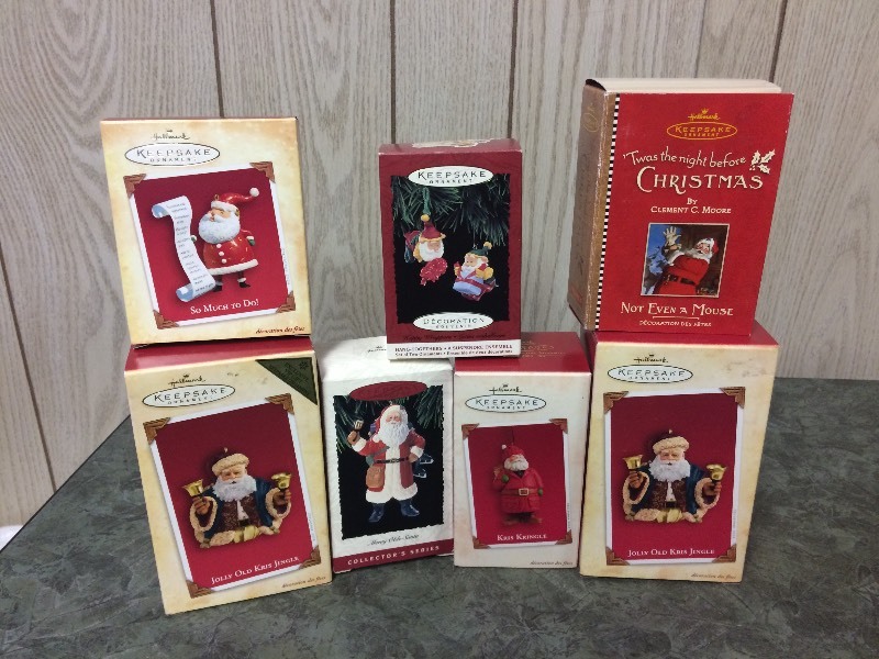 lot 52 image: 7 HALLMARK ORNAMENTS - SANTA