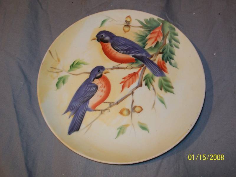 lot 12 image: 4- Collector Plates, 2- Plate Stands & 1- Heart shaped Ring Tray. Includes Signed S Tagaki,