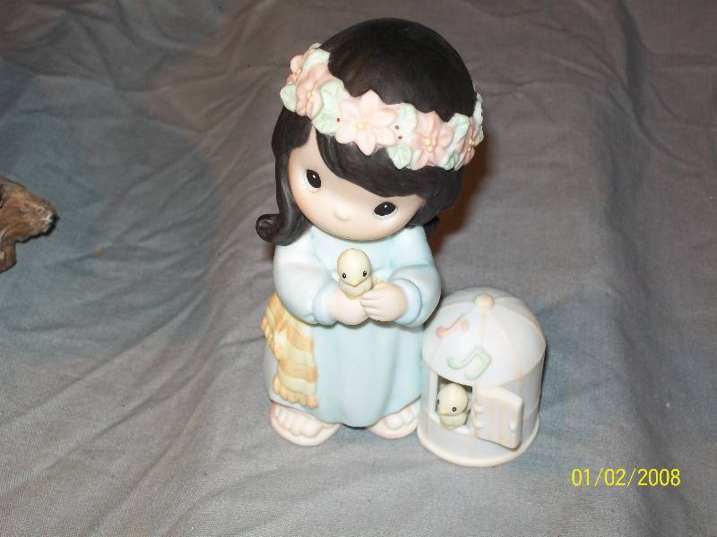 lot 35 image: 1-All Sing his Praises Precious Moments 1996 & 3- Resin Bird FigurineStatues