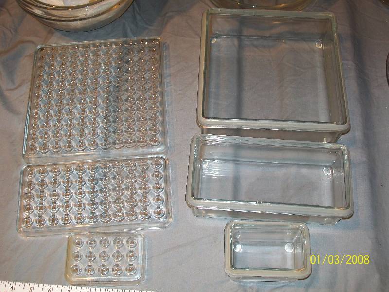 lot 62 image: 13 Piece Glass House Ware Collection, Bowls, Containers with Lids, Round Pie Plates
