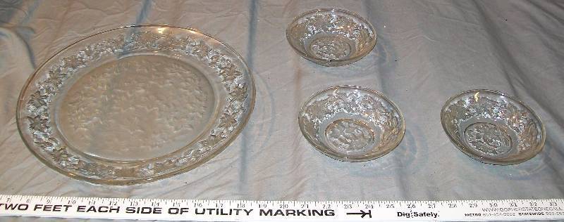 lot 71 image: 1- 13 Platter Embossed Leaf Design Frosted Glass bottom & 3- 5-14 bowls, Unknown Maker.