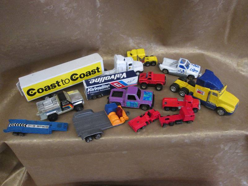 lot 2 image: Assorted Toy Trucks & Trailers...