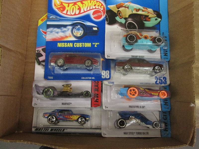 lot 30 image: 7 New in Box Hot Wheels...