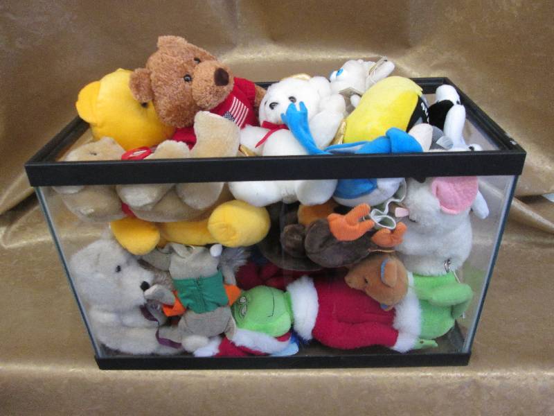 lot 49 image: Tank Full of Small Plush Animals...