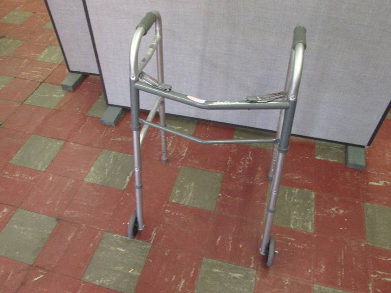 lot 110 image: Folding Metal Walker...